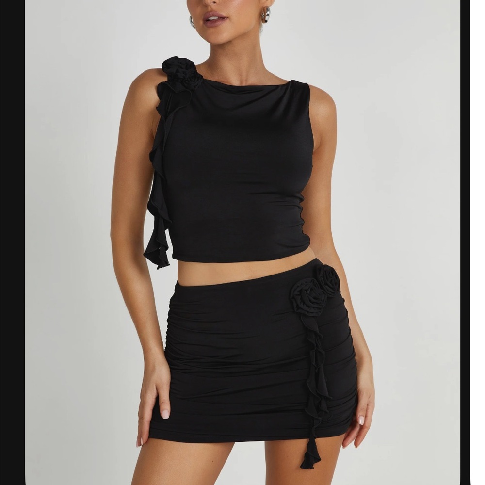 Black sleeveless top and skirt set from MESHKI - with rose embellishment